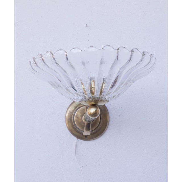 Pair of elegant and refined Barovier & Toso wall sconces in hand-blown murano glass with special processing. Each wall...