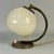 Art deco patinated brass and opaline glass table lamp, germany 1930s this vintage table or bedside lamp was designed and...