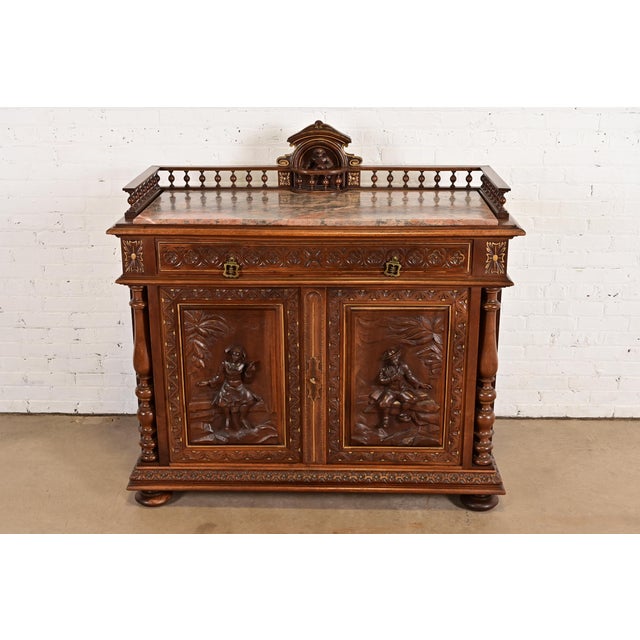 A gorgeous antique Italian Renaissance Revival sideboard, buffet server, or bar cabinet In the manner of R.J. Horner & Co....