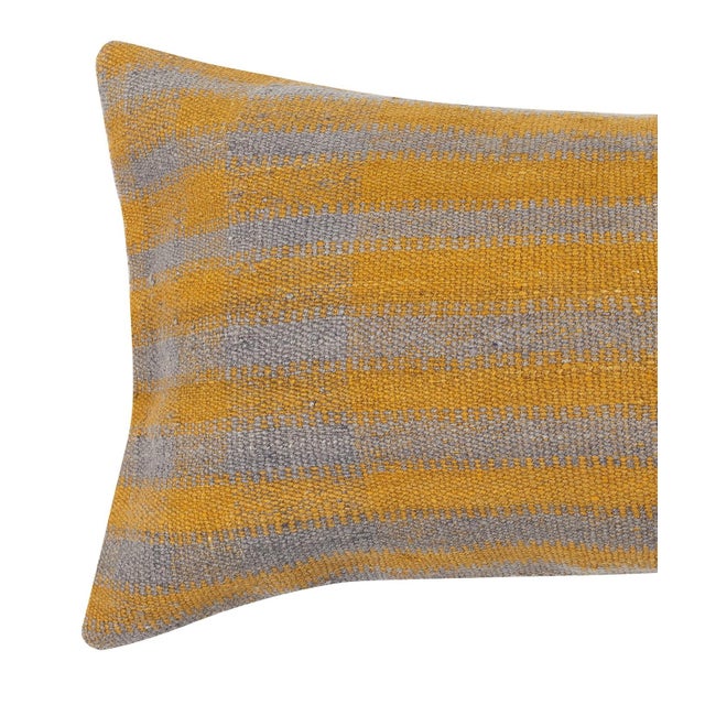 Add a touch of history and warmth to your space with this vintage handmade Turkish wool kilim cushion cover. Crafted from...