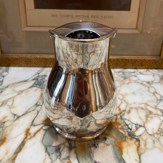 A lovely silver plated water pitcher by Reed & Barton Massachusetts.