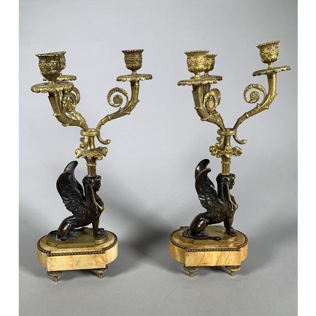 Pair of gilt bronze sphinx candelabra, early 19th century, France, Restoration period, circa 1830. Patinated and gilt...