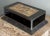 Vintage Mexican hinged tin box featuring black glass sides, decorated tin base, and a great straw mosaic picture on the...