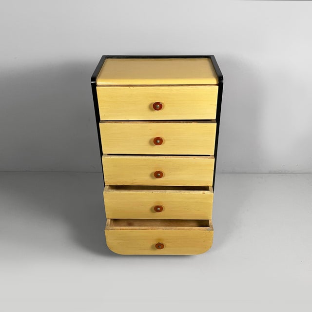 Italian Art Deco chest of drawers in light and black wood, 1930s Rectangular chest of drawers in light wood with black...