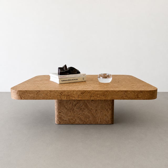Striking vintage 1970s Mid-Century Modern coffee table featuring richly figured walnut burl with a sculptural pedestal...
