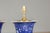 A pair of Midcentury Asian blue and white porcelain table lamps with floral décor on gilded bases, rewired for the USA....