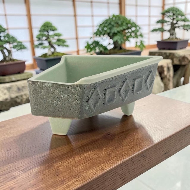 This vintage studio pottery planter, probably made in Japan during the Mid-Century period, features an asymmetrical...