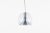 Pendant featuring smoked glass and an aluminum reflector on the inside.The diameter of the globe is 35 cm. Emits a very...
