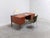 Beautiful desk in teak manufactured by Wilhelm Renz around 1960. It has three drawers on the left and shelves on the right...