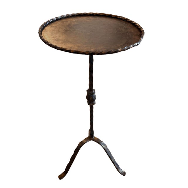 A pair of midcentury design decorative martini tables. They are hand forged and wrought iron, a typical Spanish design...