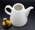 A vitro porcelain coffee service set of pot, creamer and sugar bowl designed by Inkeri Leivo in the late 1980s. Featuring...