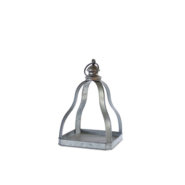 Enhance your home with this charming Set of Galvanized Metal Lanterns. Designed with an open-frame silhouette, these...