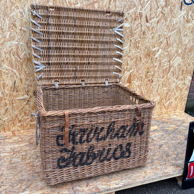 1920’s original english wicker baskets. Oversized industrial storage baskets retaining original faded branding. Handmade...
