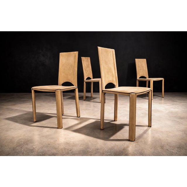 Manufactured by De Couro in Brazil, this set of four dining chairs reflects the experimental approach to leather and...