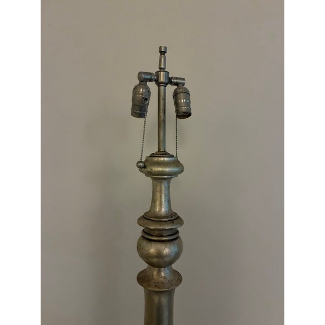 A high style 1940's silver gilt standing lamp Rewired with double cluster hardware. Great patina and presence. Some paint...