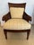 Pair of Mark Hampton mahogany Regency style armchairs having double caned backs, curved arms, turned legs and custom...