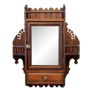 Early 1900's Victorian Wood Wall Cabinet With Beveled Mirror and Glass Knobs For Sale