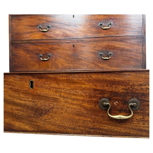 A fine 18th-century Georgian chest on chest, beautifully crafted from mahogany and displaying the elegant proportions and...