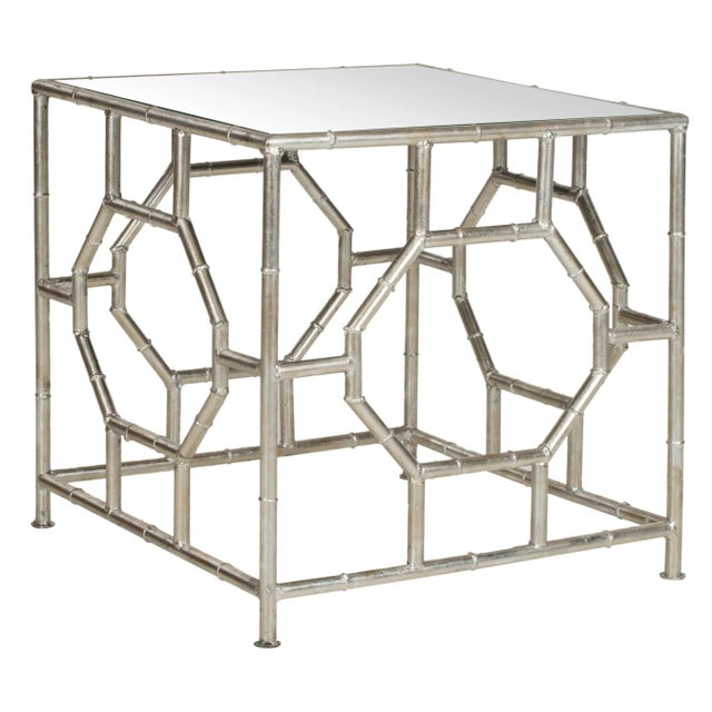 The Accent Table chic mirrored top and Chinoiserie-inspired silver leaf faux bamboo base in forged iron boast classic...