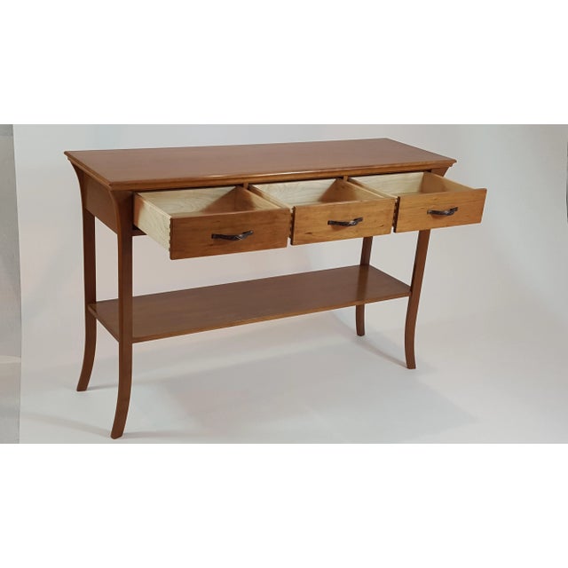 This is a transitional style - with a hint of oriental - small to medium size Hall Table, made with Cherry wood lightly...