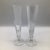 Here is an unusual pair of champagne flutes by Nautica with frosted and clear squares with clear bulb stem.