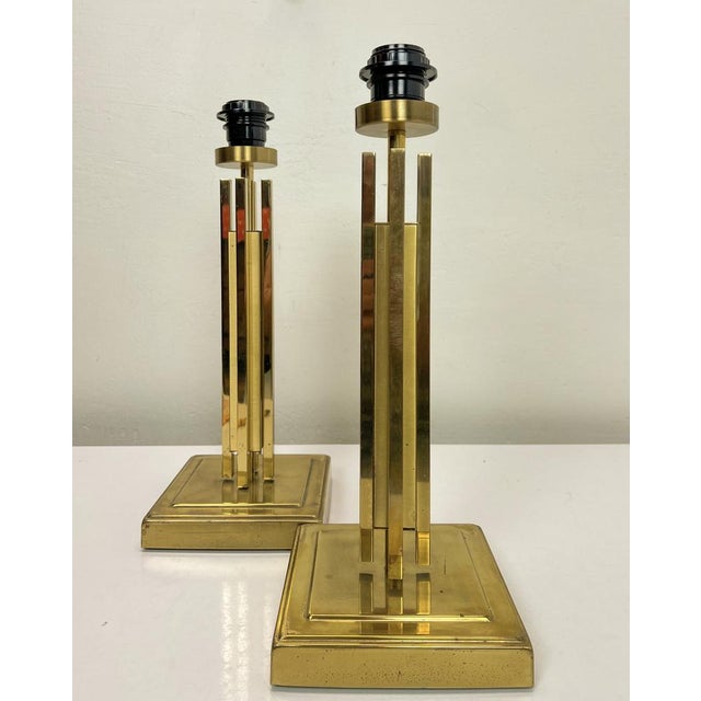 Great set of two-tone brass table lamps from the 1970s-80s. The design is reminiscent of the skyscraper period and is very...