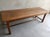 Embrace the essence of Organic Modernism with this striking 19th-century French farmhouse table, masterfully sourced and...