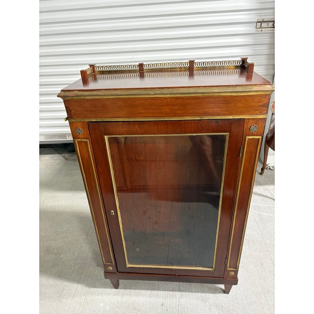 Napoleon III Style Mahogany French Glass Display Cabinet, Late 19th Century. Mahogany and brass inlay and trim. Single...
