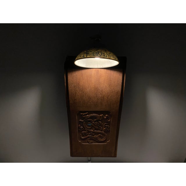 Suspended Moment is a wall sculpture where three eras converge. A 1987 chair back—its surface worn smooth by decades of...