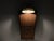 Suspended Moment is a wall sculpture where three eras converge. A 1987 chair back—its surface worn smooth by decades of...