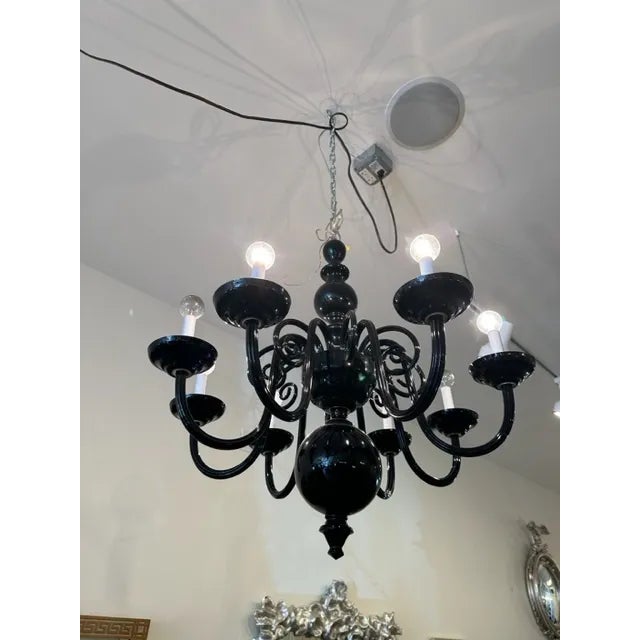 This is a unique chandelier made of black blown glass by Preciosa in Czechoslovakia. This chandelier in black adds so much...