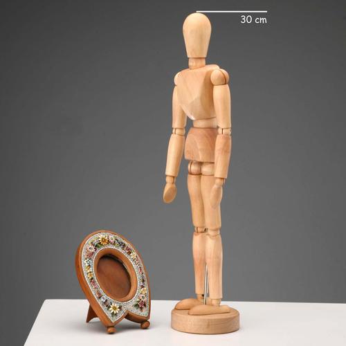 Wooden photo frame with micromosaic of polychrome flowers. This piece is attributed to the mentioned designer/maker. It...