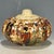 This is a fine antique Japanese Satsuma lidded jar, dating to the late Meiji or early Taisho period. The piece features...