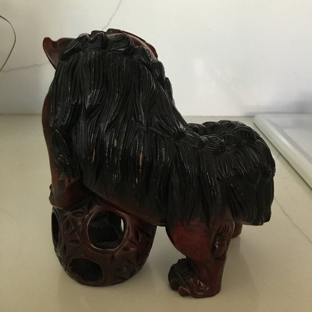 Beautifully carved Foo Dogs. Great attention given to the details of the Rosewood carving. Immaculate condition of this...