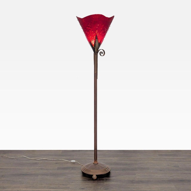 Add a pop of color to your room with this unique floor lamp. It features a vibrant red glass shade with bubble details and...