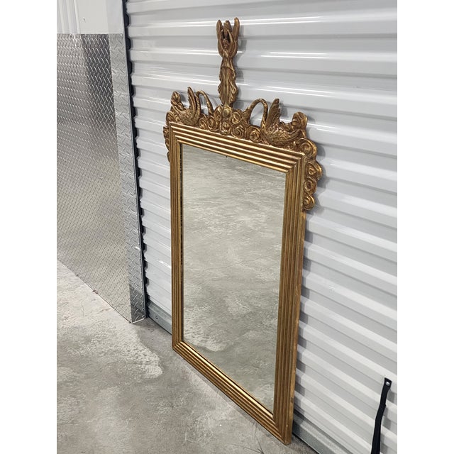 Stunning late 19th century Empire style mirror from the Waldorf Astoria Hotel in New York City. The mirror features a...