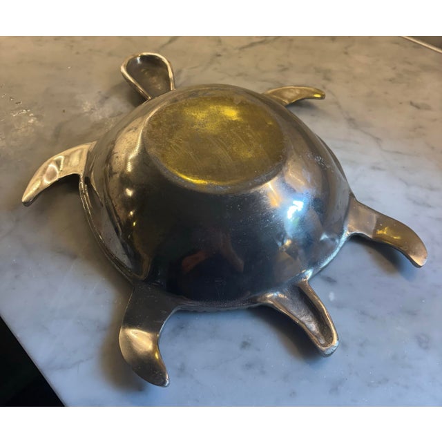 Mid 20 th century. Sandcasting. Style of Mariposa. Heavy durable. Silver tone metallic sheen. Detailed head and legs....