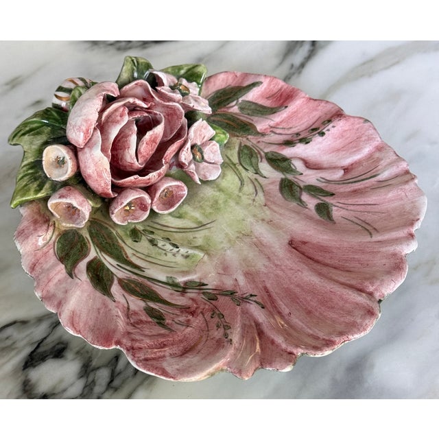 Here is a one-of-a-kind hand painted work of folk art in the form of a shell shaped trinket tray or vide poche. Artfully...