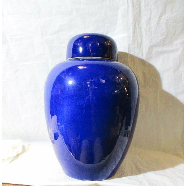 Blue Ginger Jar with white interior. Large size 14" tall and 9" in diameter. Bowl-shaped lid in matching glaze. 19th-...