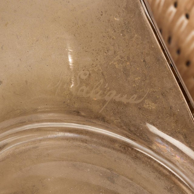 "reine marguerite" carafe in blown-molded white glass, enhanced with a hot-fired brown enamel and sepia patina. model...