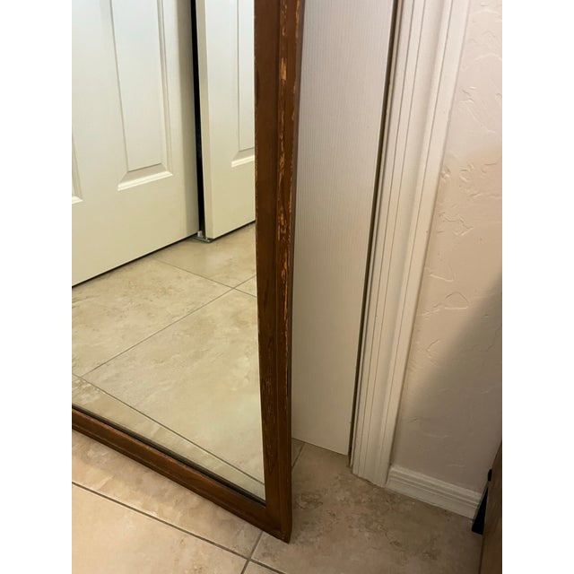1960’s Mid-Century Modern walnut framed wall mirror. A sought-after collection the Broyhill "Sculptra" line, which was...