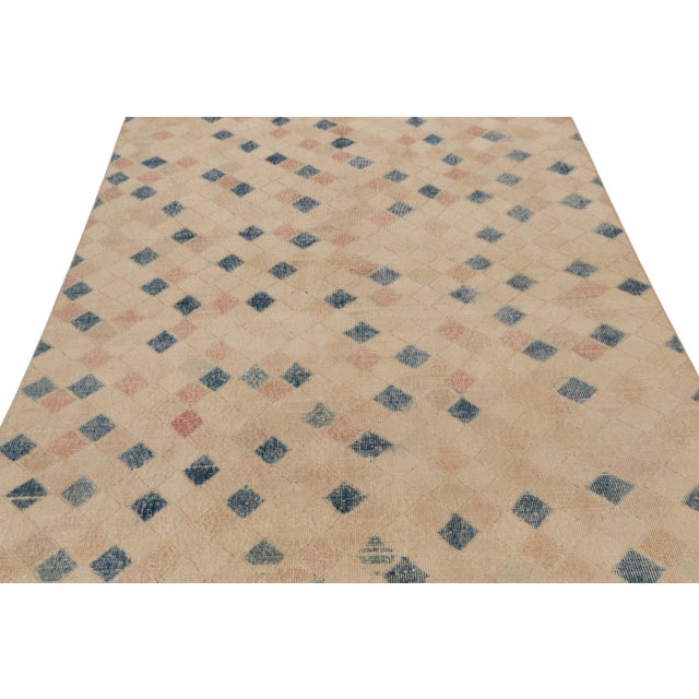 Description: This vintage rug is a 5x9 Turkish distressed piece, made with hand-knotted wool circa mid-20th century. It is...