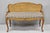 Vintage French Louis XV Style Distressed Gold Gilt Cane Back Vanity Bench Seat. Circa Mid 20th Century. Measurements:...