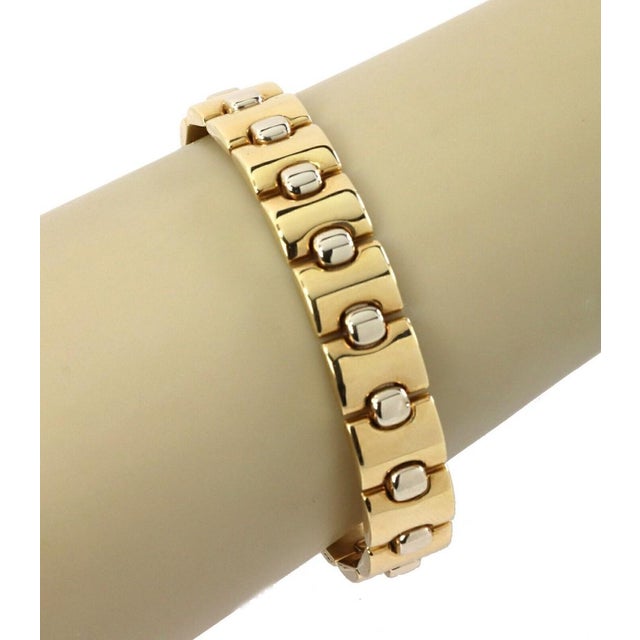 A lovely and authentic bracelet by Italian designer KRIA. It is crafted from 18k yellow and white gold with a high-...