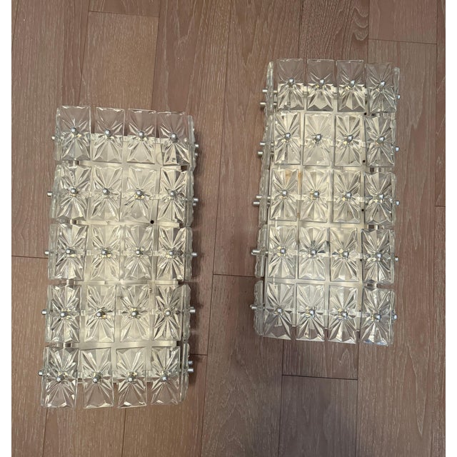 A pair of large 1960s crystal East German wall lights by Veb Narva Leuchten. Came out of a public building. Original...