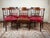 This assembled set of six English George III–style dining chairs brings together four late 18th-century examples with two...