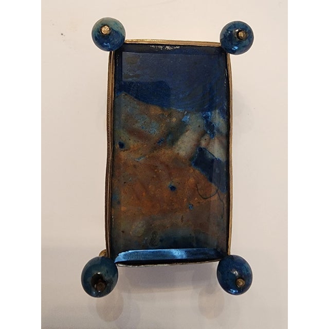 Gilt brass surrounds Lapis Lazuli on adorable ball feet. Small in size but a real eye catcher.