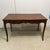 This Classic Drexel Heritage Writing Desk has two drawers with brass hardware. The cabriole legs provide a look of...
