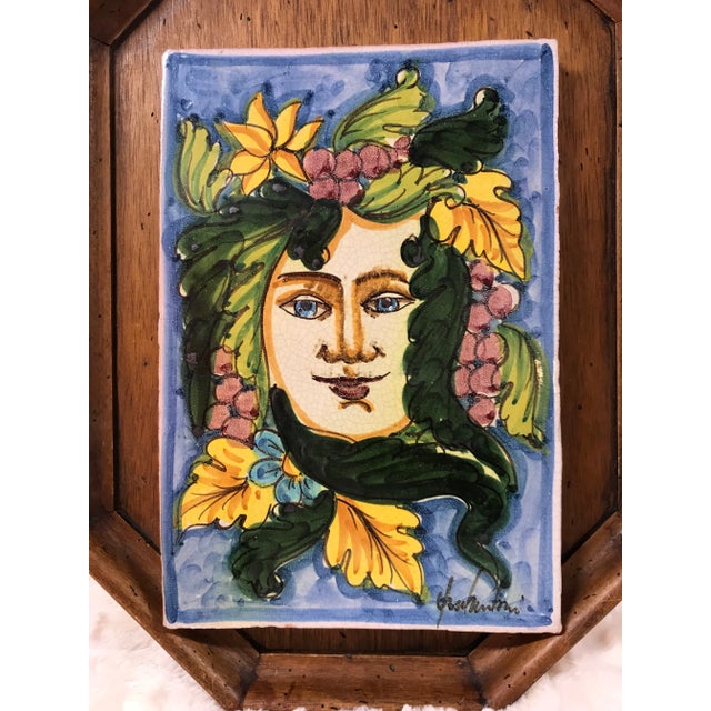 This beautiful vintage painted Italian tile features a gorgeous female fave with striking blue eyes. It appears her hair...
