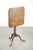 This antique English oak tilt-top table/side table has a unique square shape and dates from the early 19th century. The...